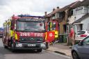 Firefighters at the scene of a house fire in Dagenham (Lucy North/PA)