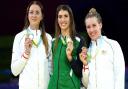 The three medallists in the Birmingham 2022 200m freestyle S14 - Bethany Firth (gold, centre), Jessica-Jane Applegate (silver, left) and Louise Fiddes