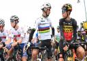 Oli Stockwell (left) next to world champion Julian Alaphilippe and eventual winner Wout van Aert at the start line on stage one of the Tour of Britain.