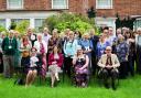 Volunteers and staff, including CEO Dr Helen Glenister (front left), at the Isabel Hospice tea party held at Homestead Court in Welwyn Garden City