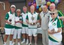 The triples cup final went to Martin Taylor, Ian Kirsch and Terry Crane, right of presenter Gordon Price. Picture: SHIRE PARK BC