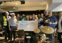 Rotarians present cheque