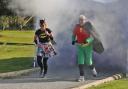 New Brookmans Park Golf Club captains dressed as Batgirl and Robin. Picture: BRIAN HALL