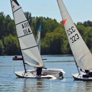 Annette Walter and Dave Lambert head the fleet in race one.