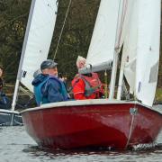 Roger Morse leads the fleet home in race two. Picture: VAL NEWTON