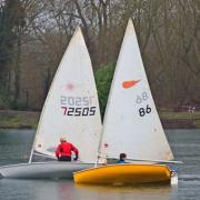 Mike Caddy leads Angelo Hansen but loses on handicap in the first race. Picture: VAL NEWTON