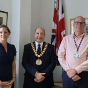 Nicola MacKinnon, community fundraising officer, and Jonny Whitehead, CEO of Herts Young Homeless with Mayor Marsh