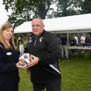 Bellway sales advisor Katie Bagshaw with Lee Kisby, Chairman of Cuffley FC, at the club’s annual tournament.