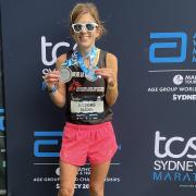 Rebecca Barden of Garden City Runners with her Sydney Marathon medals. Picture: GCR