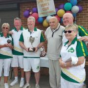 The triples cup final went to Martin Taylor, Ian Kirsch and Terry Crane, right of presenter Gordon Price. Picture: SHIRE PARK BC