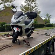 A moped seized in Welwyn Garden City.