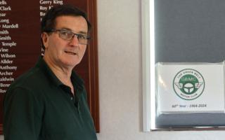 Green Belt president Richard Warne cuts the club’s 60th anniversary cake . Picture: CHRISTINE MATTHEWS