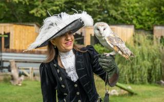 High Sheriff of Hertfordshire Annie Brewster with Gertie the barn owl at Hertfordshire Zoo