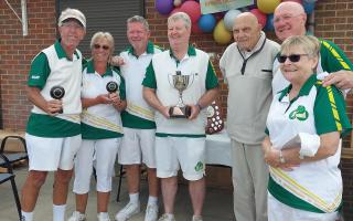 The triples cup final went to Martin Taylor, Ian Kirsch and Terry Crane, right of presenter Gordon Price. Picture: SHIRE PARK BC