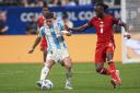 Ismael Kone in action against Argentina's Julian Alvarez at the Copa America