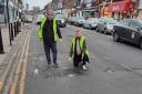 Cllr Asif Khan (left) has been involved in a two-year fight to get the potholes fixed.