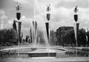 The Coronation Fountain in Parkway 1953 - with temporary banners as part of the Coronation celebrations in Welwyn Garden City. Image donated to the Welwyn Garden City Heritage Trust archive by Marian T.