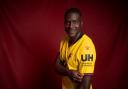Ken Sema showcases the new University of Hertfordshire branded Watford FC shirt
