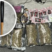 Drugs and weapons were both seized during the raid.