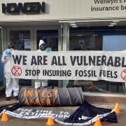 Extinction Rebellion protestors outside Howden in Welwyn Garden City.