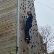 Sir Oliver on the climbing wall at Cuffley Active Learning Centre