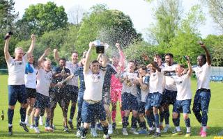 AFC Welwyn celebrate their league title as captain Jack Bradshaw lifts the trophy. Picture: CAYLA DU PLESSIS