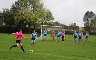 Emma Bowers puts in a cross for Welwyn United. Picture: WUFC