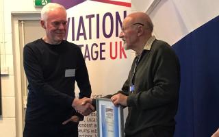 Ian Thirsk (left) receives his lifetime achievement award